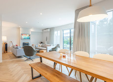 Poolside living: a large oval pool