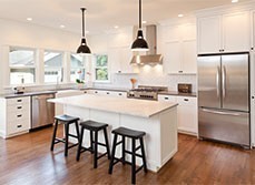 Kitchen renovation with floating island bench and subway tiles
