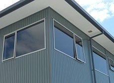 How much does it cost to re-clad your home on a basic budget in the United States?