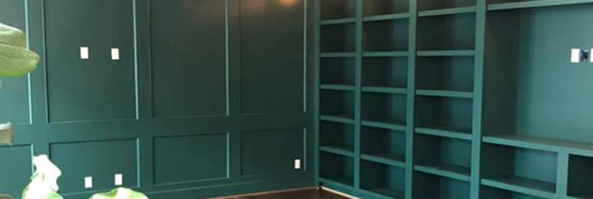 This renovation established a beautiful showcase for the homeowners' book collection by integrating features of a traditional library.