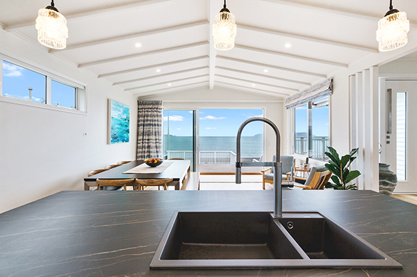 A home can be renovated but you can't build a view. Big changes were made to this beachfront property so that it could be more livable for the long term.