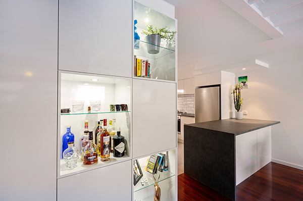 This apartment has been renovated with a contemporary design that enhances its industrial character while improving its functionality.