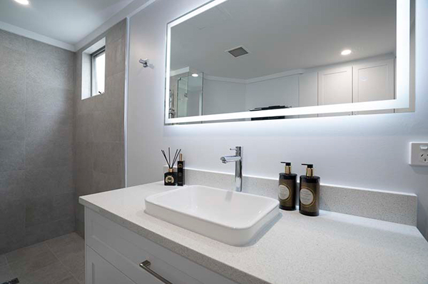 With a reconfigured layout and completely upgraded interior, this ensuite has become much more spacious and functional than its original build