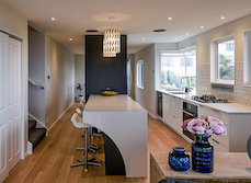 This renovation used the term “flipping” quite literally, swapping the ground-floor bedrooms and the first-floor living area.