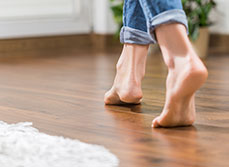 Girl walking on underfloor heating