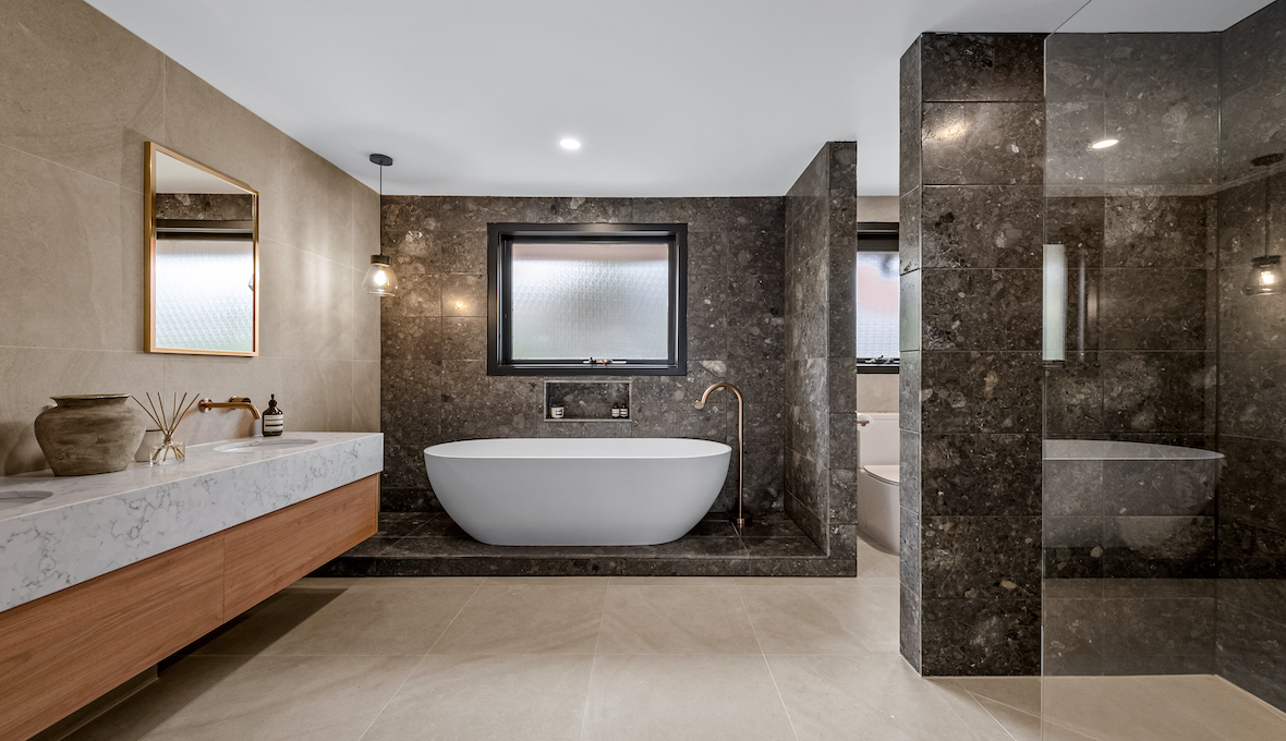 Modern bathroom remodeling design with freestanding oval bathtub