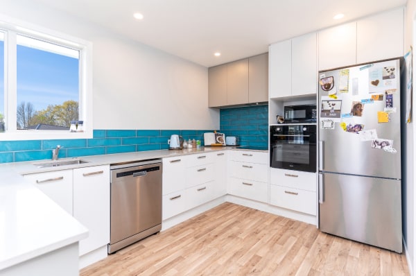 kitchen renovation with blue tiles