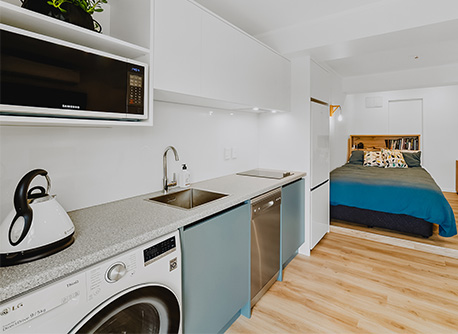 basement conversion with kitchen and laundry inside