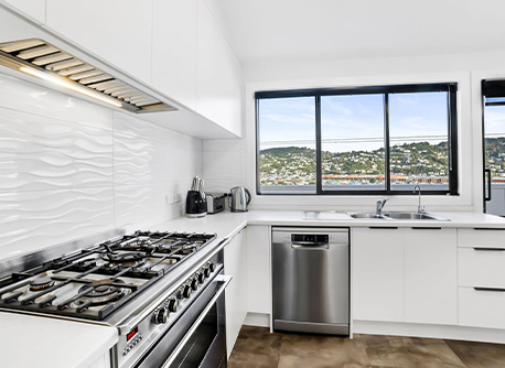 Kitchen with white cabinets