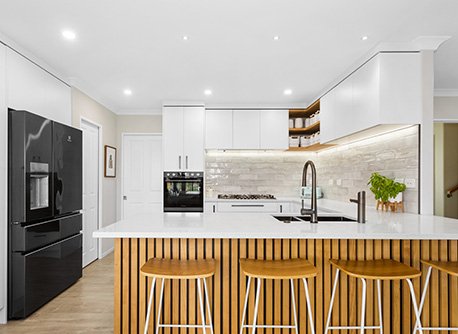 Kitchen with polished white tiles