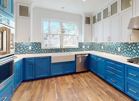 Blue kitchen with blue funky tiled splashback