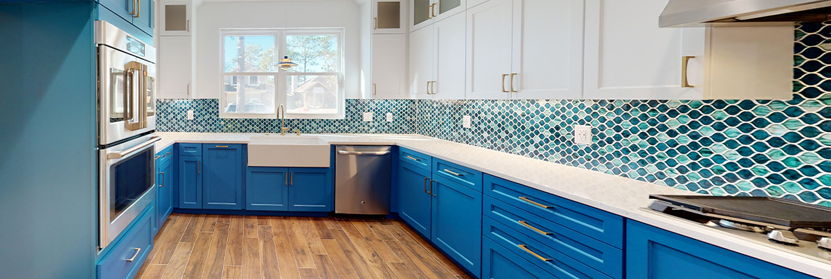 Blue kitchen with blue funky tiled splashback