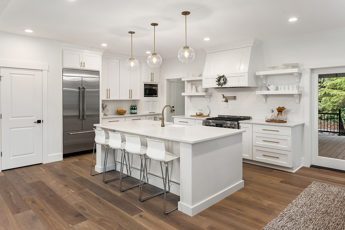 Our Refresh Renovations Remodeling contractors in The Woodlands have completed this modern Kitchen remodel that contains beautiful wooden floors, island benching.