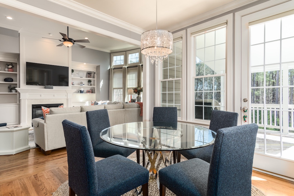 A Finished Home remodel project in The Woodlands TX area by our Refresh Renovations Consultants. Showcasing a full remodel of a dining area with a pendant light as a feature.