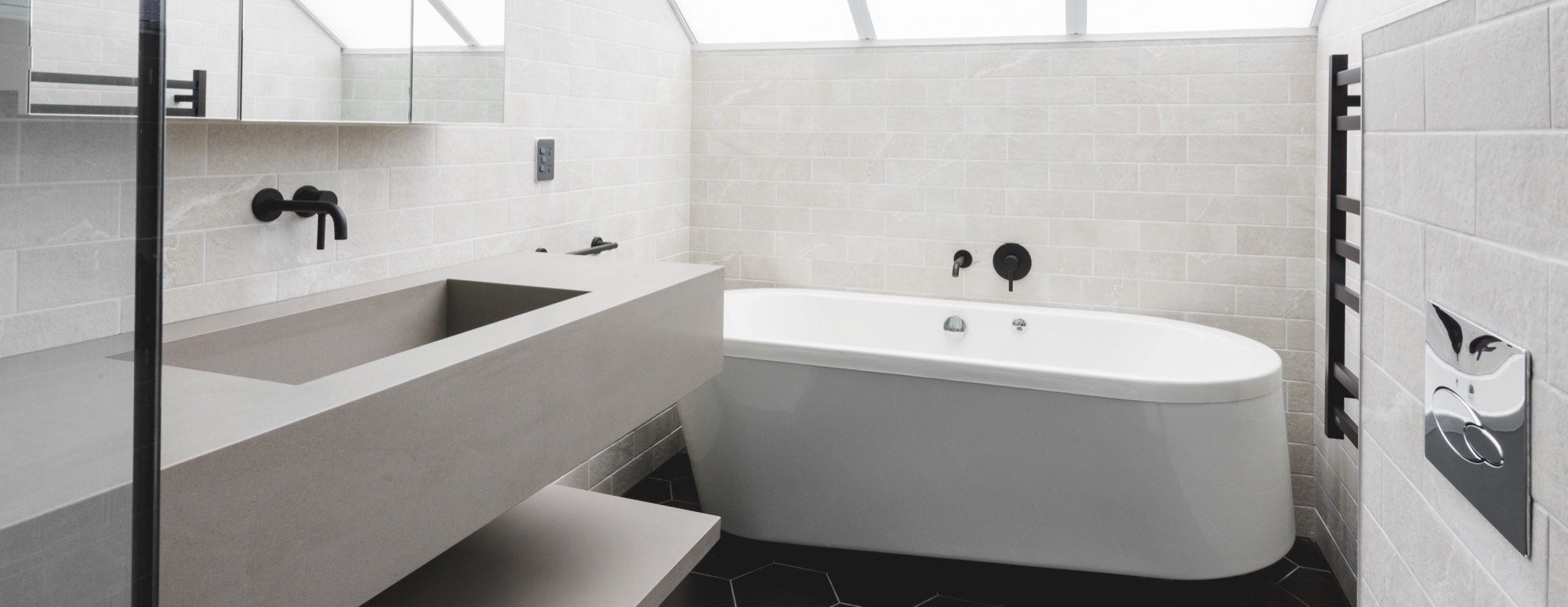 black hexagon tiles with modern tiled bathroom