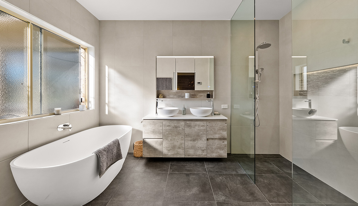Modern Bathroom Remodel finished with a freestanding tub and walk-in-shower.