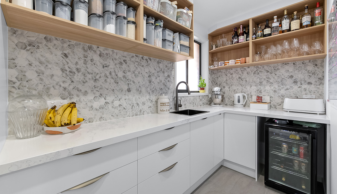 Modern White kitchen remodeling in Boulder with overhead storage