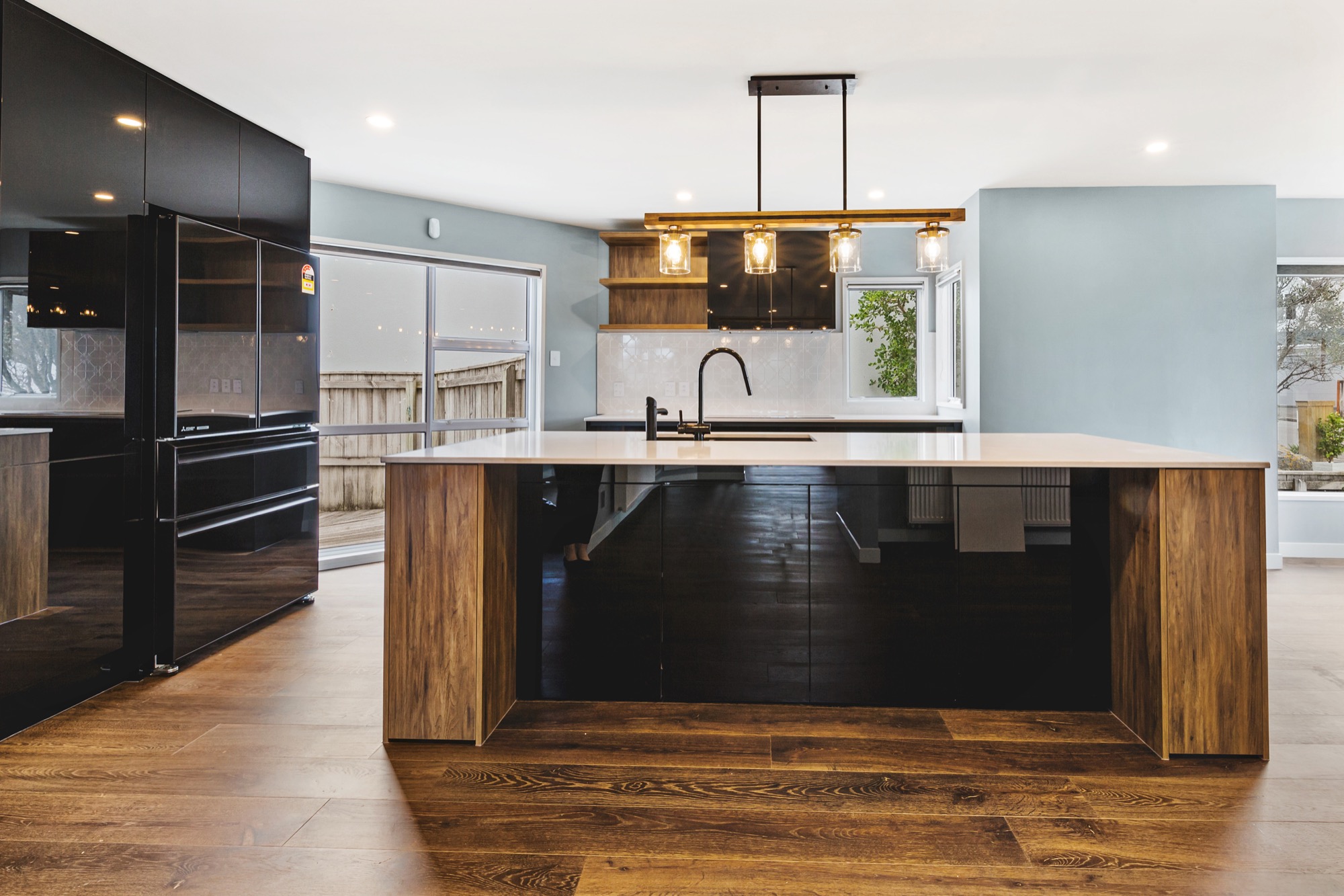 Timber benchtop with black fixtures