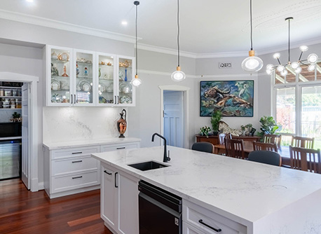 Kitchen with hardwood floorboards