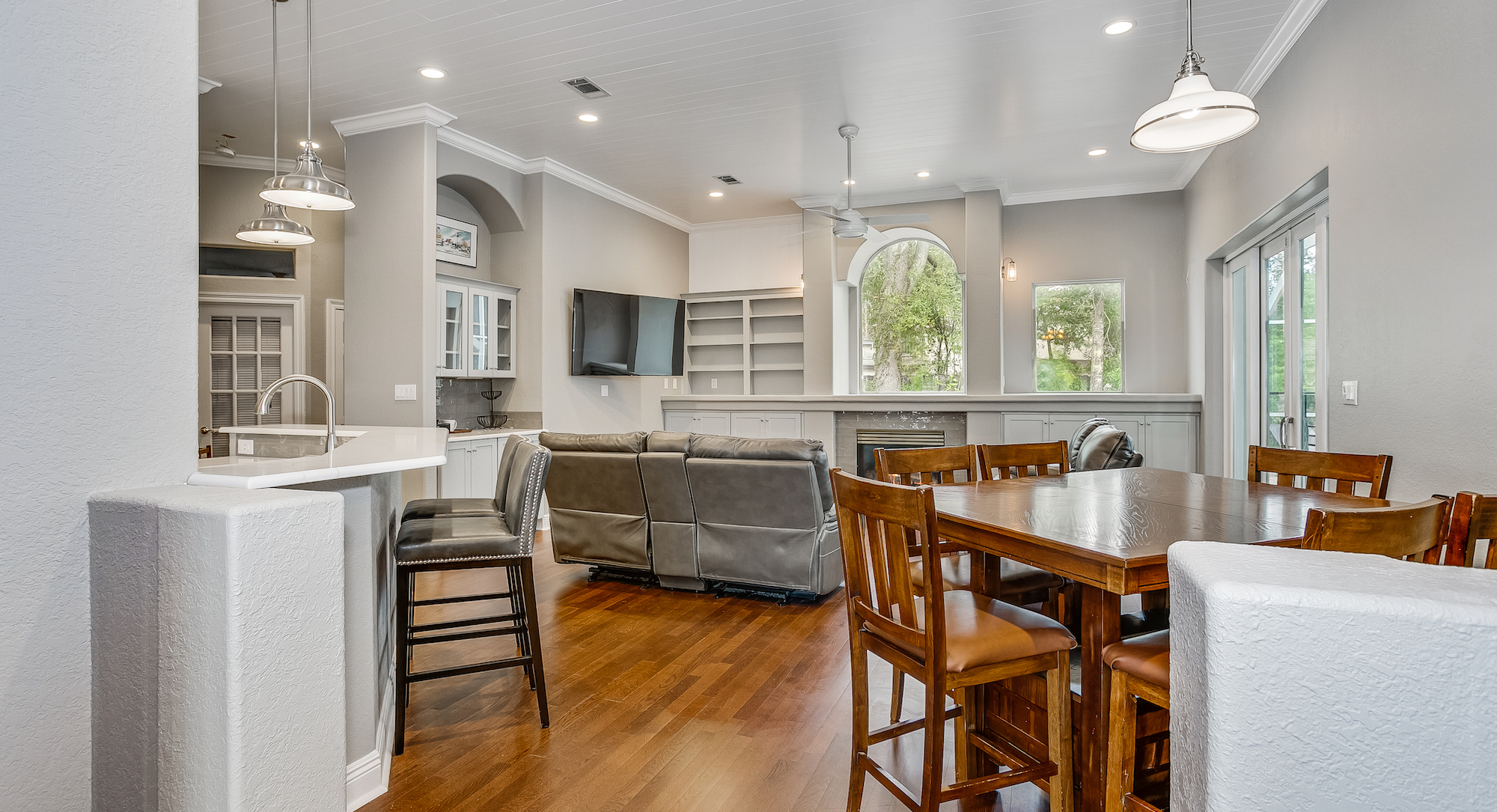 open plan kitchen and living room with grey walls