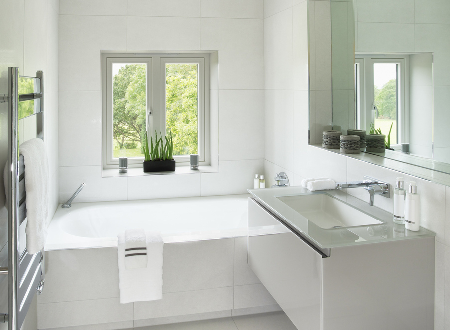 Light bright bathroom with white tiles