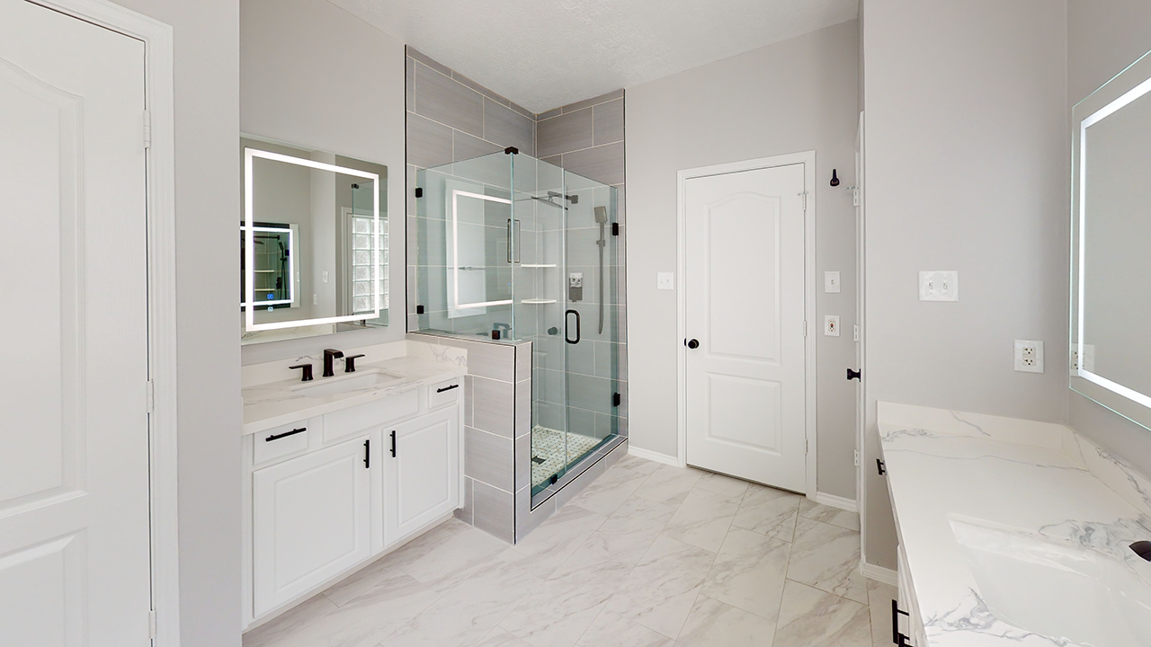 Refresh Renovations Home remodeling contractors. Showcasing a beautiful marble tiled bathroom floor and bench with light great colored walls