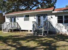 A remodeled outdoor area with backyard accessibility in Pensacola, Florida