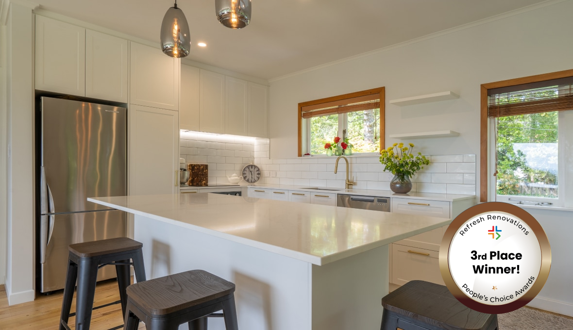 Hamptons style kitchen with white and sage green