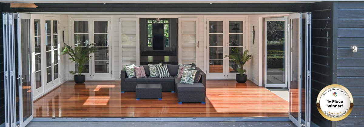 Indoor-outdoor flow with gold badge in the bottom right corner