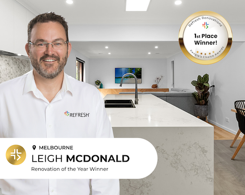 Leigh Mcdonald standing in front of his award winning renovated kitchen