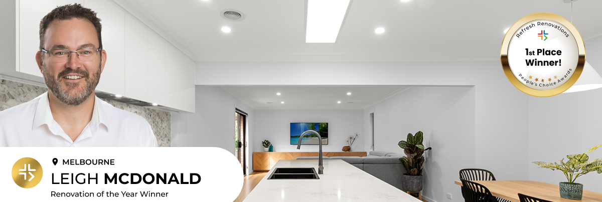 Leigh Mcdonald standing in front of his award winning renovated kitchen