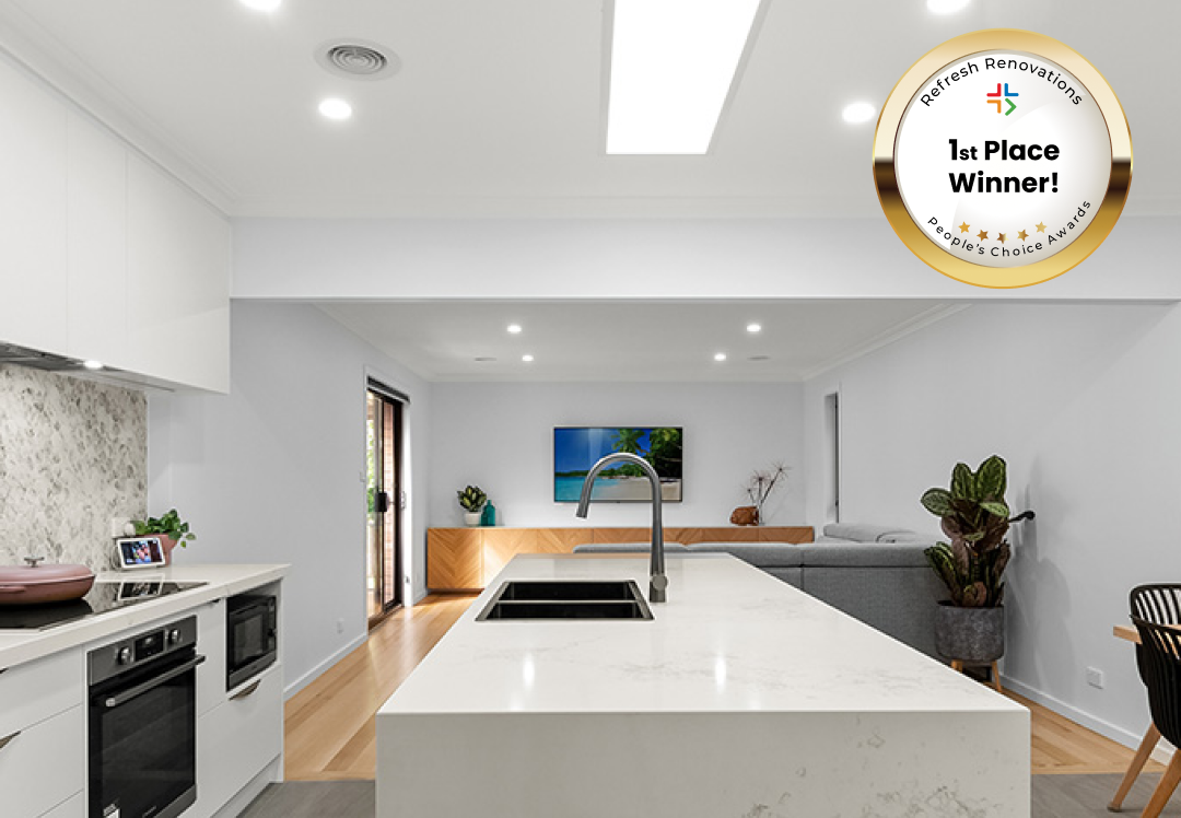 Kitchen with waterfall marble kitchen island